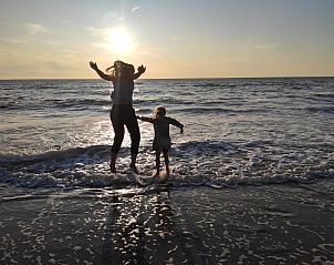 Enjoy the sunset by the sea at Callantsoog, near vacation home Wijde Blick 205 on the North Sea coast.