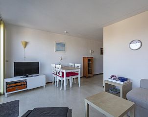 Dining area in Wijde Blick 301 Callantsoog vacation home on the North Sea coast in North Holland.