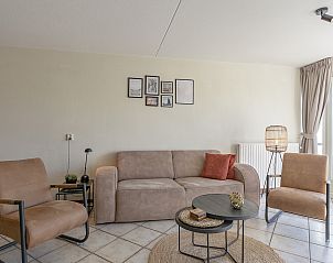 Comfortable sitting area in Wijde Blick 309 Callantsoog, vacation home on the North Sea coast in North Holland.
