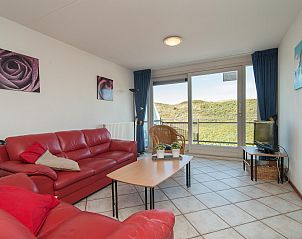 Comfortabele zithoek in Wijde Blick 310 Callantsoog, vakantiehuis aan de Noordzeekust in Noord-Holland