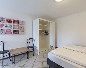 Ingerichte slaapkamer van Wijde Blick 310 Callantsoog, vakantiehuis aan de Noordzeekust, Noord-Holland