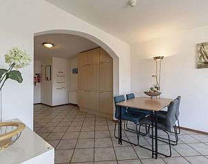 Dining area in Wijde Blick 311 Callantsoog, vacation home in Callantsoog, North Holland.