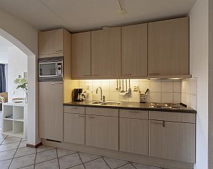 Modern kitchen in Wijde Blick 311 Callantsoog, vacation home on the North Sea coast in Callantsoog, North Holland.