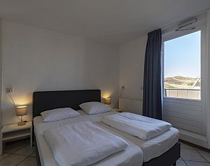 Cozy bedroom in Wijde Blick 311 Callantsoog, vacation home on the North Sea coast in North Holland.