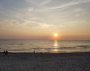 Sunset at the beach at Wijde Blick 311 Callantsoog, vacation home in Callantsoog, North Holland.