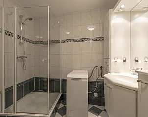 Modern bathroom in Wijde Blick 208 Callantsoog, vacation home on the North Sea coast, North Holland.