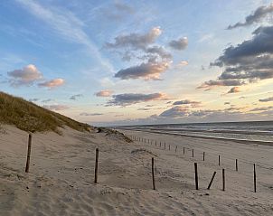 Sonnenuntergang am Strand des Ferienhauses Buitenplaats 062 Callantsoog an der Nordseekste.