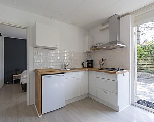 Modern kitchen in Effe Sprage Callantsoog vacation home on North Sea coast.