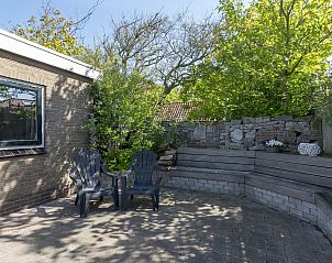 Sitting area in the garden of Effe Sprage Callantsoog vacation home, Callantsoog.