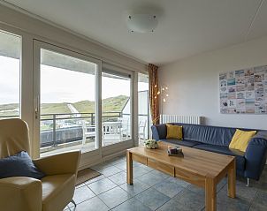 Comfortable sitting area in Wijde Blick 206 Callantsoog, vacation home on the North Sea coast, ideal for relaxation.