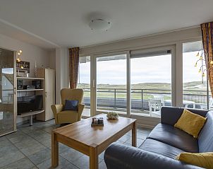 Bright living room in Wijde Blick 206 Callantsoog, vacation home on the North Sea coast, overlooking the dunes.