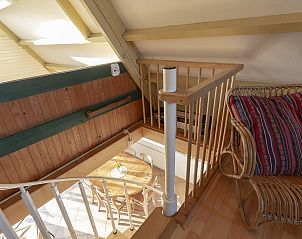 Stairs to attic in Sandepark 093 Groote Keeten vacation home in Callantsoog, North Sea coast.