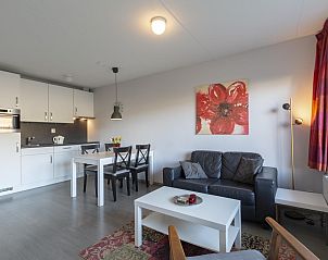 Living room of Beach Apartment 08 Callantsoog with modern decor in North Holland.