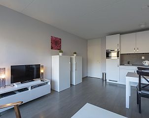 Spacious living room of Beach Apartment 08 Callantsoog in North Holland.