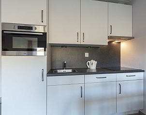 Compact kitchen of Beach Apartment 08 Callantsoog in Callantsoog.