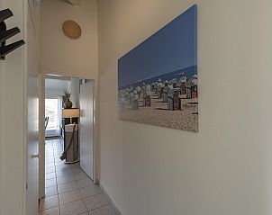 Terras met uitzicht op de duinen bij Beach Appartement 36 Callantsoog, Noord-Holland.