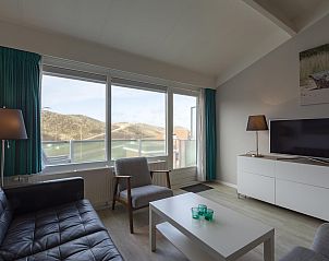 Cozy sitting area in Beach Apartment 35 Callantsoog overlooking the dunes.