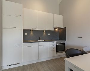 Fully equipped kitchen in Beach Apartment 35 Callantsoog for a comfortable stay.