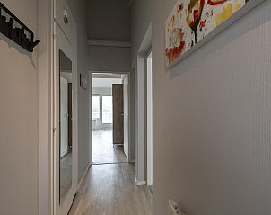 Hall of Beach Apartment 35 Callantsoog with access to several rooms.