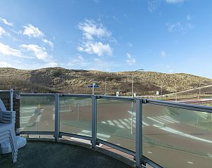 Balcony overlooking the dunes at Beach Apartment 35 Callantsoog, North Holland.