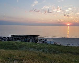 Breathtaking sunset at the beach at Beach Apartment 35 Callantsoog.