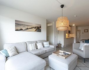 Comfortable sitting area in Wijde Blick 212 Callantsoog, vacation home on the North Sea coast.