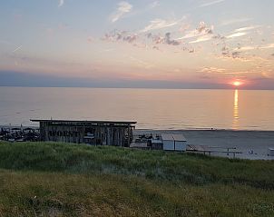 Sunset at beach pavilion near Wijde Blick 212 Callantsoog, North Holland.
