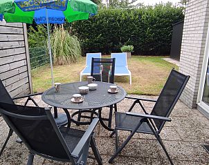 Bright living room in NH549, Callantsoog, North Sea Coast, with comfortable chairs and maritime decoration.