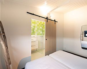 Modern bathroom in Royal Dune 4, Callantsoog, with stylish shower and sink.