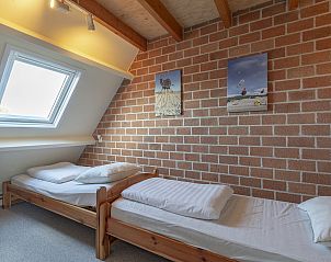 Second bedroom with sloping wall and skylight in Abbestederweg 24A Callantsoog