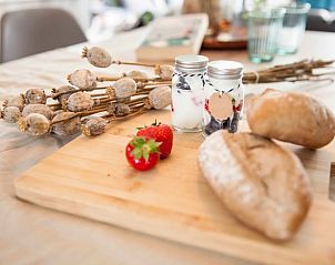 Healthy breakfast at Holiday Home in Callantsoog, North Sea Coast, North Holland, with bread and strawberries.