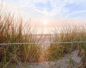Beautiful sunset at Holiday home in Callantsoog, North Sea coast, North Holland, overlooking the sea.