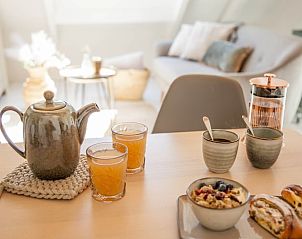 Cozy sitting area in Cottage in Callantsoog, vacation home on the North Sea coast in North Holland.