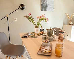 Stylish dining area in Cottage in Callantsoog, vacation home on the North Sea coast in North Holland.