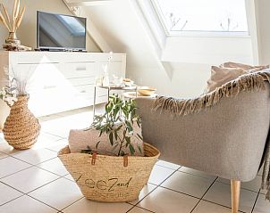 Bright living room in Cottage in Callantsoog, vacation home on the North Sea coast in North Holland.