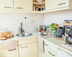 Fully equipped kitchen in Cottage in Callantsoog, vacation home on the North Sea coast in North Holland.