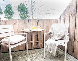 Private terrace at Cottage in Callantsoog, vacation home on the North Sea coast in North Holland.