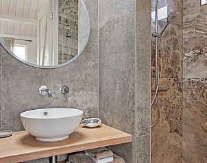 Modern bathroom in Cottage in Callantsoog, vacation home in North Holland with stylish finish.