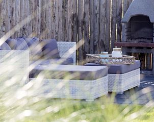 Gezellig terras met loungehoek in Luxe huis aan de kust, Callantsoog, vakantiehuis aan de Noordzeekust.