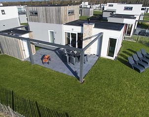 Buitenzijde van Luxe huis aan de kust in Callantsoog met ruime tuin, vakantiehuis aan de Noordzeekust, Noord-Holland.