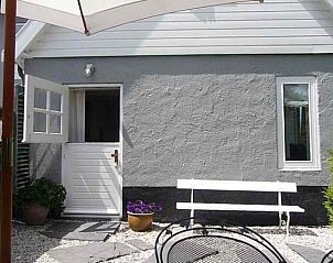 Adembenemende zonsondergang aan de Noordzeekust nabij NH072 vakantiehuis in Groet.