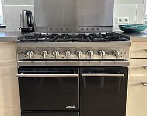 Ruim terras bij NH141 vakantiehuis Groet Noordzeekust Noord-Holland