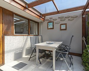 Gezellig terras bij Wildrijk 152 Sint Maartenszee vakantiehuis aan de Noordzeekust.