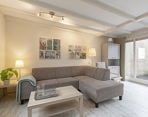 Gezellige woonkamer in vakantiehuis Duinland 181 Sint Maartenszee, Noordzeekust, Noord-Holland.