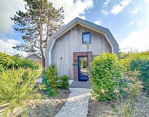 Vakantiehuis Duinland in Egmond aan den Hoef omringd door groene natuur, Noordzeekust Noord-Holland, serene buitenruimte.