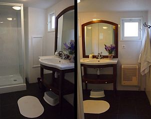 Modern bathroom in Duinroos Cottage, a vacation home in Egmond aan den Hoef on the North Sea coast, North Holland.