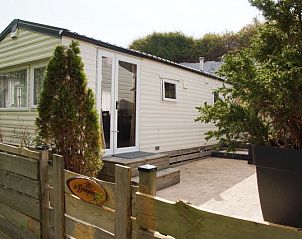 Zee en duin chalet in IJmuiden met privterras en groene omgeving aan de Noordzeekust.