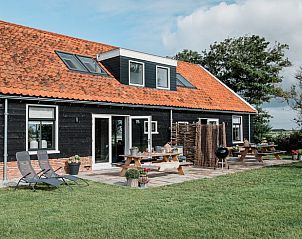 Vakantiehuis in Burgerbrug met ruim terras en ligstoelen, Noordzeekust, Noord-Holland.