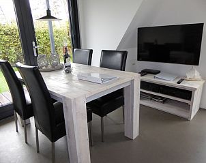 Gezellige eetruimte in Sandepark 29 vakantiehuis, Groote Keeten, Noordzeekust, Noord-Holland.