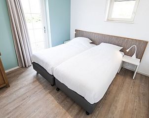 Guest house 454024 - Bungalow Noordzeekust - Beach Resort Ooghduyne | 12-persoons villa | 12C